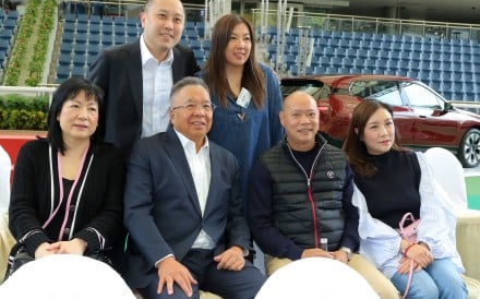 The Wong family - with Janice back right and Matthew second from left at the front - and trainer Chris So (second from right at the front) at the Hong Kong Derby barrier draw. Photos: Kenneth Chan