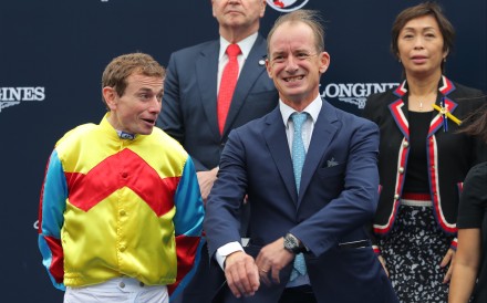 Jockey Ryan Moore and trainer Richard Gibson celebrate Wellington’s victory in the 2022 Hong Kong Sprint. Photo: Kenneth Chan
