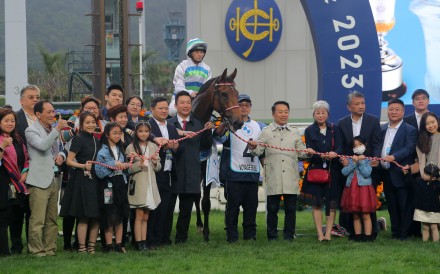 Trainer Ricky Yiu and jockey Alexis Badel celebrate Voyage Bubble’s Hong Kong Derby victory with connections. Photo: Kenneth Chan