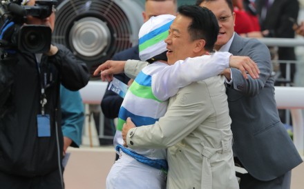 Ricky Yiu hugs jockey Alexis Badel after their Derby success. Photos: Kenneth Chan