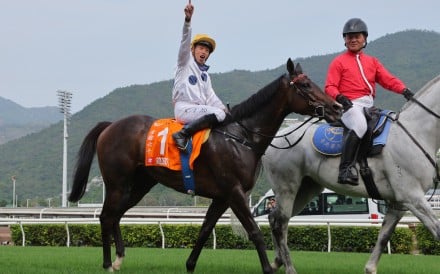 An ecstatic Vincent Ho celebrates Golden Sixty’s victory in the Champions Mile at Sha Tin on Sunday. Photos: Kenneth Chan