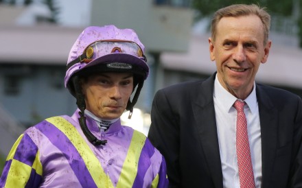 Jockey Alexis Badel and trainer John Size celebrate Seizing The Moment’s win at Sha Tin on Sunday. Photo: Kenneth Chan