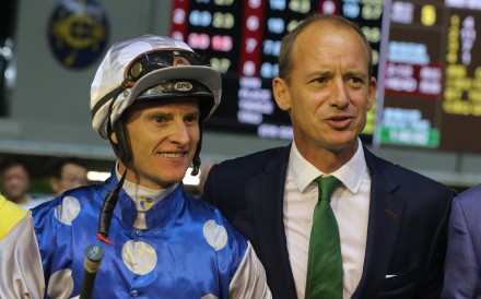 Jockey Zac Purton and trainer Richard Gibson celebrate Right Honourable’s win at Happy Valley in September 2018. Photo: Kenneth Chan