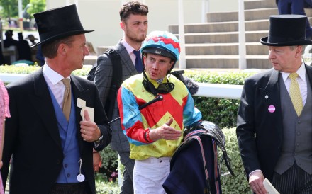 Trainer Richard Gibson, a bloodied Ryan Moore and Jockey Club chief executive Winfried Engelbrecht-Bresges debrief after Wellington’s Royal Ascot 10th. Photos: Pun Kwan