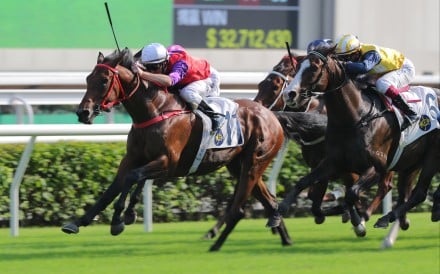 Zac Purton drives Ensued to victory at Sha Tin on Sunday. Photos: Kenneth Chan