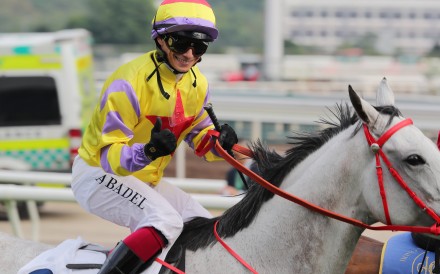 Alexis Badel celebrates aboard Class Two Peninsula Golden Jubilee Challenge Cup (1,200m) winner Ping Hai Galaxy at Sha Tin on Sunday. Photo: Kenneth Chan