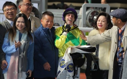 Trainer Manfred Man and jockey Brenton Avdulla celebrate Sky Forever’s victory with connections. Photo: Kenneth Chan