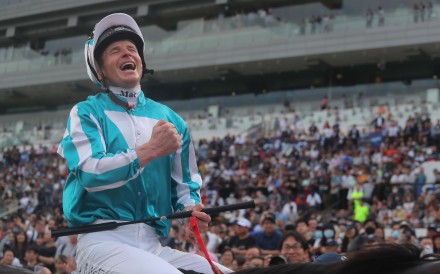 James McDonald thumps his chest in celebration after triumphing aboard Romantic Warrior in December’s Group One Hong Kong Cup (2,000m). Photo: Kenneth Chan