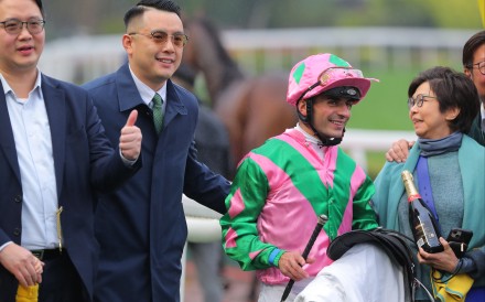 Trainer Pierre Ng and jockey Andrea Atzeni celebrate with Aeroinvincible’s connections at Sha Tin on Sunday. Photo: Kenneth Chan