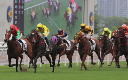 Lucky Sweynesse (yellow and blue colours) wins Sunday’s Group Two Sprint Cup (1,200m) at Sha Tin. Photos: Kenneth Chan