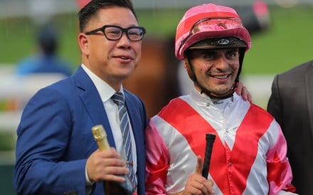 Dennis Yip and Andrea Atzeni celebrate after Phoenix Light wins at Sha Tin. Photos: Kenneth Chan
