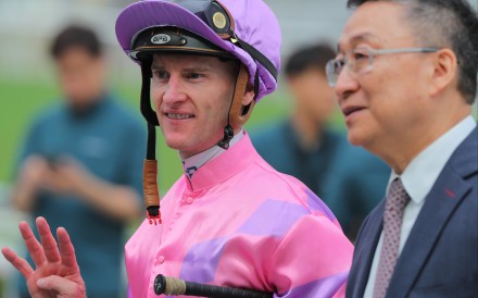 Jockey Zac Purton celebrates his fourth win of the afternoon with trainer Francis Lui at Sha Tin on Sunday. Photos: Kenneth Chan