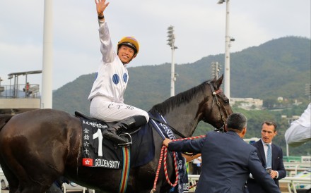 Jockey Vincent Ho waves to the crowd after Golden Sixty’s win in December’s Hong Kong Mile. Photo: Kenneth Chan