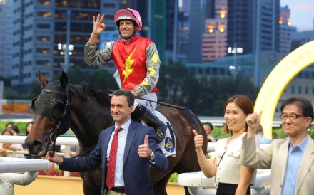 Hugh Bowman, Douglas Whyte and connections celebrate Majestic Knight’s Happy Valley win. Photos: Kenneth Chan