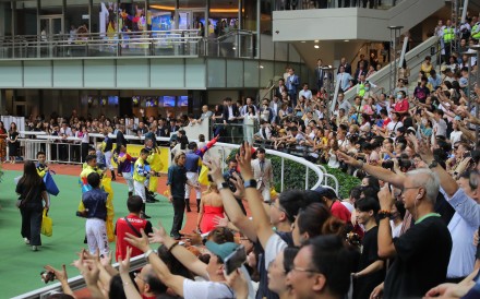 Jockeys gather before punters at the Sha Tin Racecourse. The Jockey Club said it faced significant external challenges during the financial year, including rising competition from Macau’s casinos. Photo: Kenneth Chan.