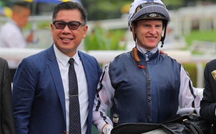 Dennis Yip and Zac Purton celebrate Fast Network’s Sha Tin victory. Photos: Kenneth Chan