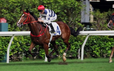 Packing Power bolts in on debut under Zac Purton at Happy Valley. Photos: Kenneth Chan