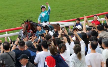 James McDonald celebrates Romantic Warrior’s QE II Cup win at Sha Tin in April. Photo: Kenneth Chan