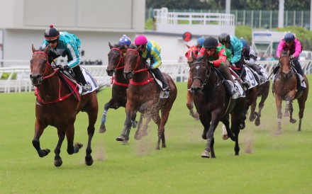 Romantic Warrior (left) leads throughout under Hugh Bowman to win a Happy Valley trial on Saturday morning. Photo: Kenneth Chan