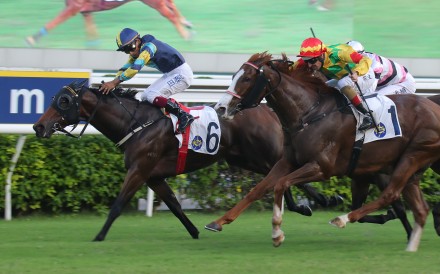 Karis Teetan lifts Lady’s Choice (left) to a narrow win at Sha Tin. Photos: Kenneth Chan