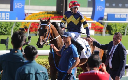 Hugh Bowman and Caspar Fownes celebrate Family Jewel’s latest win at Sha Tin. Photos: Kenneth Chan