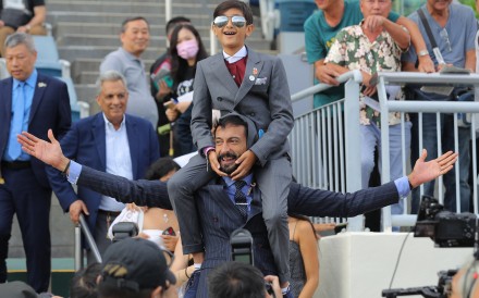 Owner Roshan Melwani celebrates Karma’s victory with his son. Photos: Kenneth Chan