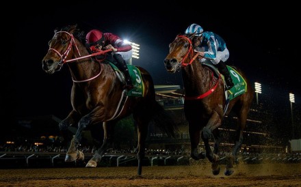 Forever Young narrowly denies Romantic Warrior (inside) in a pulsating finish to the Saudi Cup. Photos: Alex Evers/HKJC