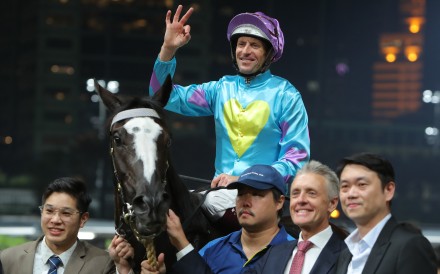 Hugh Bowman celebrates his third  win at Happy Valley on Wednesday night on Casa Rochester. Photos: Kenneth Chan