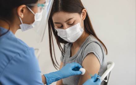 A person receives a vaccination. WHO member states agreed on a landmark pandemic agreement to prevent future crises, addressing equity and tech transfer. Photo: Shutterstock