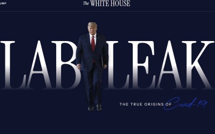 The updated website shows a photo of US President Donald Trump walking between the words “lab” and “leak” under a White House heading. Image: covid.gov