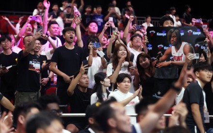 Basketball fans attend the 12th Yao Foundation Charity Game at the AsiaWorld-Expo on August 20. Photo: Jonathan Wong
                                