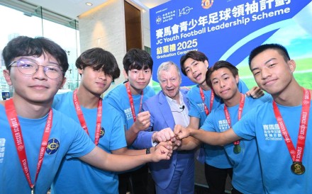 The six winners, including Sam Lo (third from left) and Jacky Cheung (far right), with Hong Kong Jockey Club CEO Winfried Engelbrecht-Bresges. Photo: Hong Kong Jockey Club