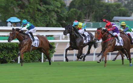 Copartner Prance (left) and Keagan de Melo hold on for victory. Photos: Kenneth Chan