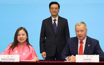 (From the left) Sports minister Rosanna Law, Chief Executive John Lee and Jockey Club CEO Winfried Engelbrecht-Bresges at the signing ceremony. Photo: Handout