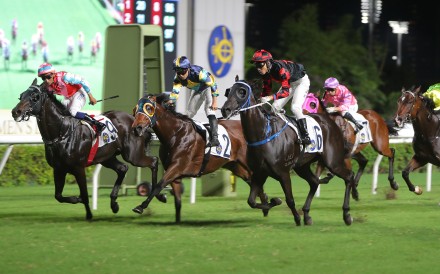 Dancing Code and Ellis Wong (right) get up in the nick of time at Sha Tin. Photo: Kenneth Chan