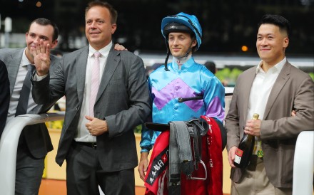 Trainer Caspar Fownes (second from left) celebrates his Happy Valley four-timer with son Ronan (left), jockey Harry Bentley and connections of Lo Rider. Photos: Kenneth Chan