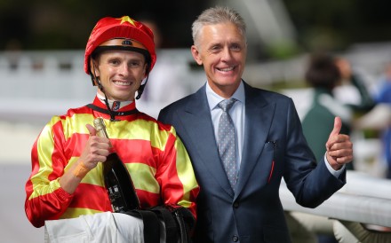 Jockey Lyle Hewitson and trainer Mark Newnham are all smiles after New Forest’s win on Thursday night. Photos: Kenneth Chan