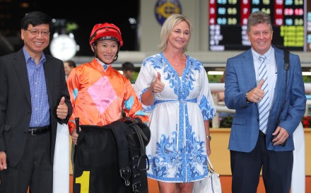 Trainer Brett Crawford (right) celebrates his first Happy Valley winner on Wednesday night. Photos: Kenneth Chan