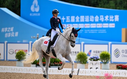 Hong Kong’s Annie Ho and her horse, Lord Sandro K, finished seventh in the individual dressage final. Photo: Xinhua
