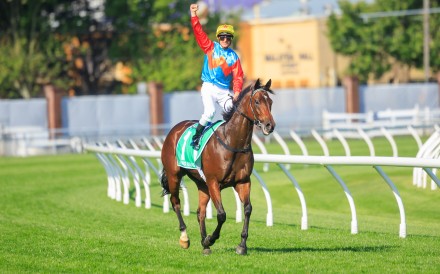 Zac Purton celebrates his epic The Everest win on Ka Ying Rising. Photo: HKJC