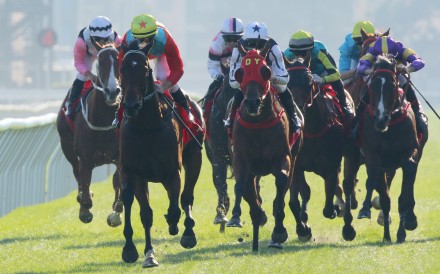 Ka Ying Rising (red sleeves) storms to yet another win at Sha Tin on Sunday. Photos: Kenneth Chan