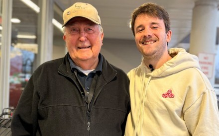 Australian influencer Sam Weidenhofer (right) with 88-year-old US supermarket worker Ed Bambas from Michigan. Photo: Instagram/itssozer