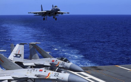 A J-15 fighter jet preparing  to land on the flight deck of the Chinese navy’s Liaoning aircraft carrier. Photo: AP
