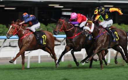 Andrea Atzeni and Amazing Kid (12) give John Size his first Happy Valley winner of the season. Photos: Kenneth Chan