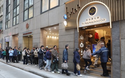 A long queue outside the Hong Kong Jockey Club’s Stanley Street betting shop on Saturday. Photo: Edmond So