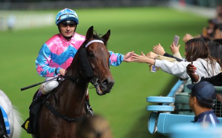 Andrea Atzeni celebrates a Happy Valley winner. Photos: Kenneth Chan