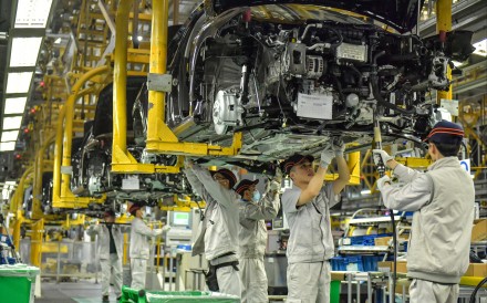 Employees work on the assembly line of vehicles at a workshop of FAW-Volkswagen on December 9, 2025, in Chengdu in China’s Sichuan province. Photo: VCG via Getty Images