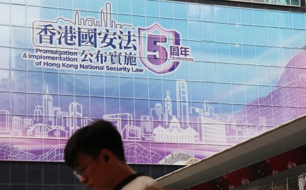 A poster in Wan Chai commemorating the fifth anniversary of the 2020 national security law. Photo: Jelly Tse