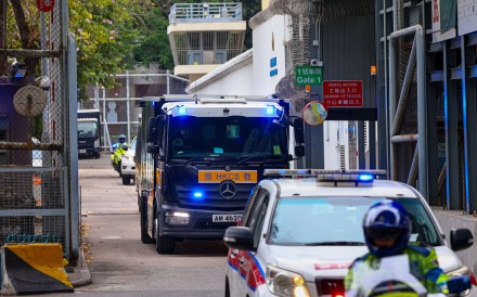 A Hong Kong Correctional Services vehicle carrying former media tycoon Jimmy Lai leaves the Lai Chi Kok Reception Centre and heads to the West Kowloon Court on February 9. Photo: Dickson Lee
