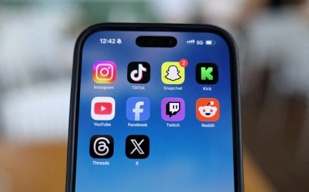 Social media apps displayed on a mobile phone. Germany’s ruling party has called for fines against online platforms that fail to enforce social media curbs for children. Photo: Reuters